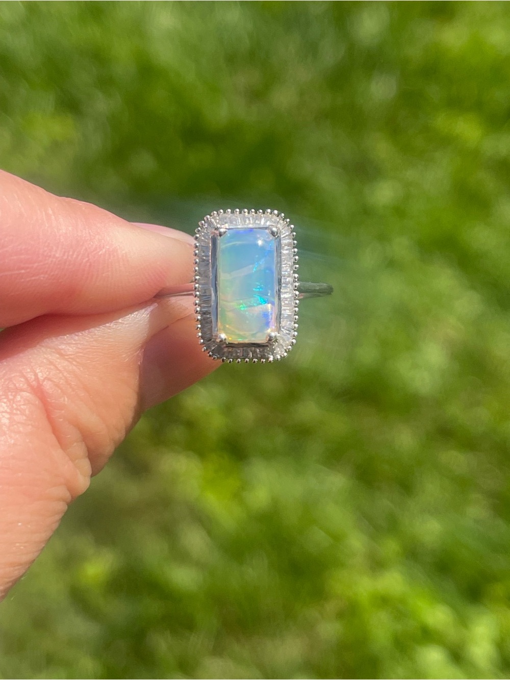 Ethiopian Welo Opal and Diamond Halo Ring